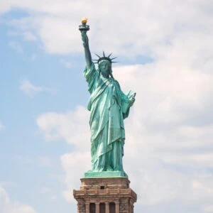 a wide angle photo of the Statue of Liberty in New York City
