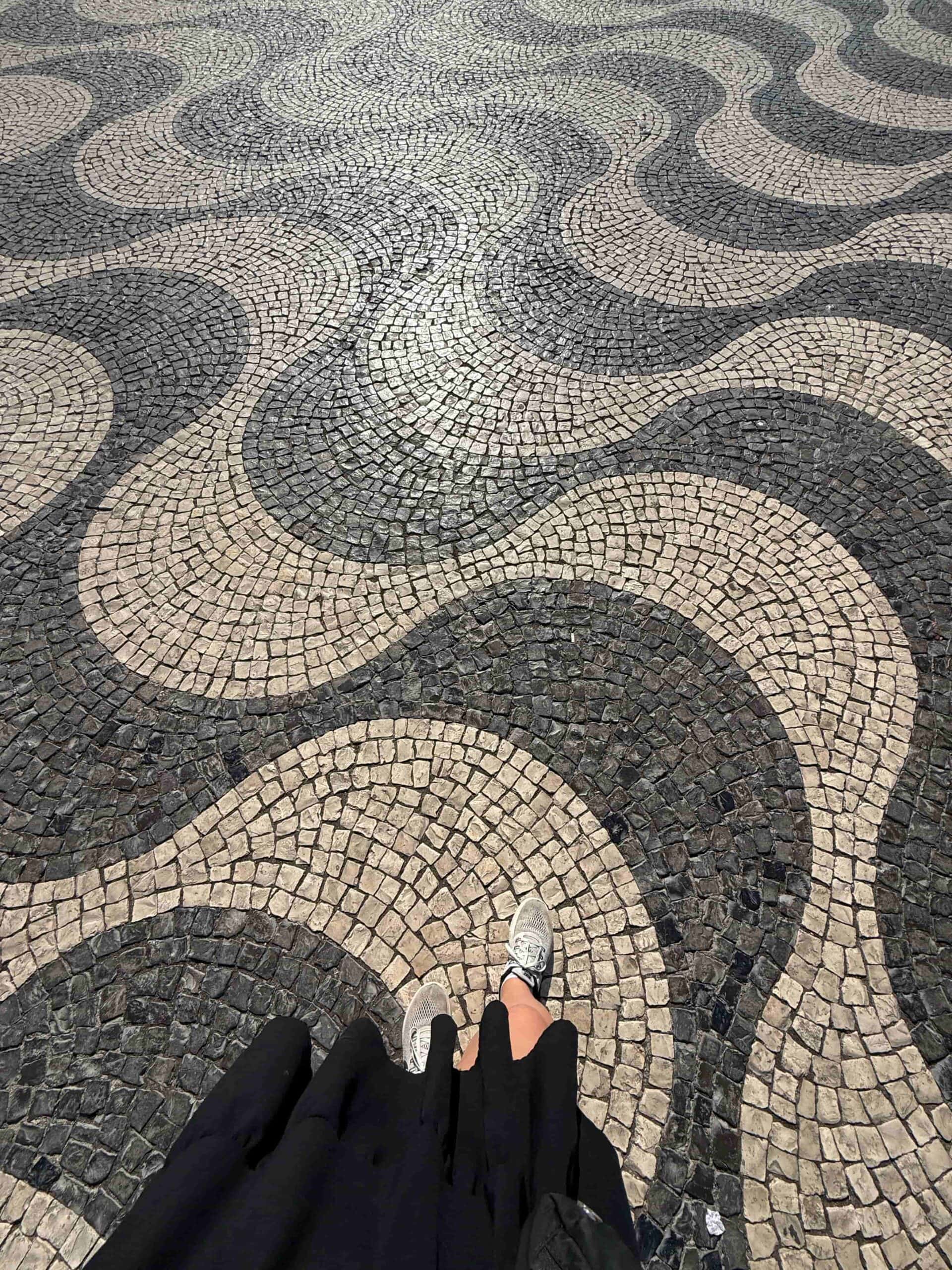 Calçada portuguesa wave-pattern cobblestones in Lisbon's Baixa district